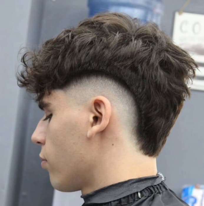 Corte texturizado y fade realizado en Neo